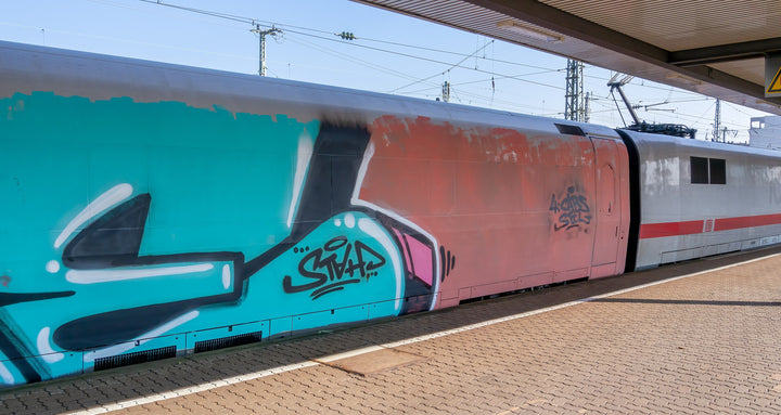 ICE passenger trains covered in graffiti at Würzburg main station, Germany. Photo: Ermell, CC BY-SA 4.0, via Wikimedia Commons