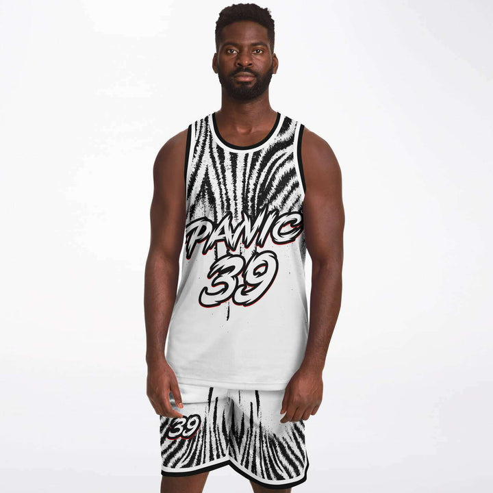 Model wearing the Panic 39 zebra print basketball jersey and shorts