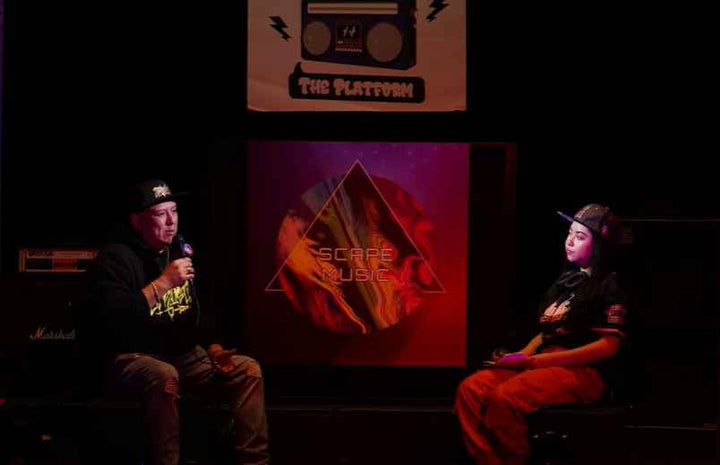 DJ APX 1 being interviewed on The Platform show set
