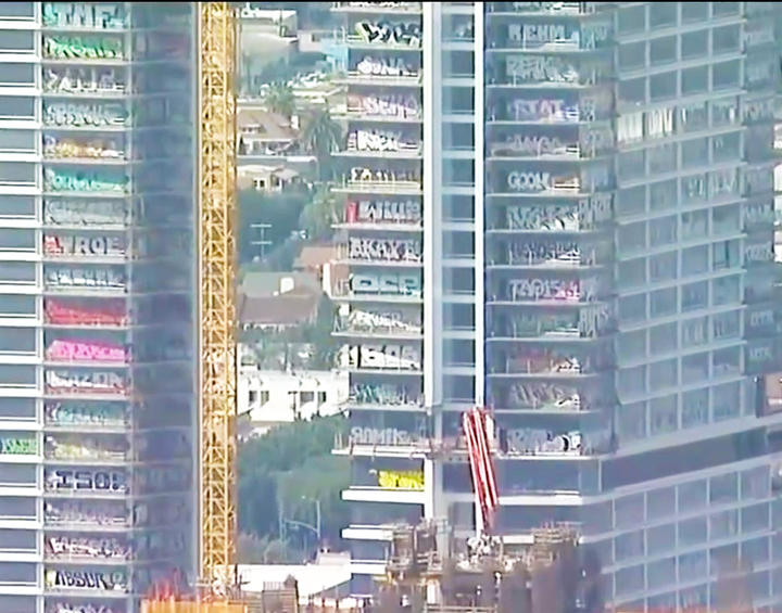 Oceanwide Plaza towers in downtown LA tagged up on almost every floor