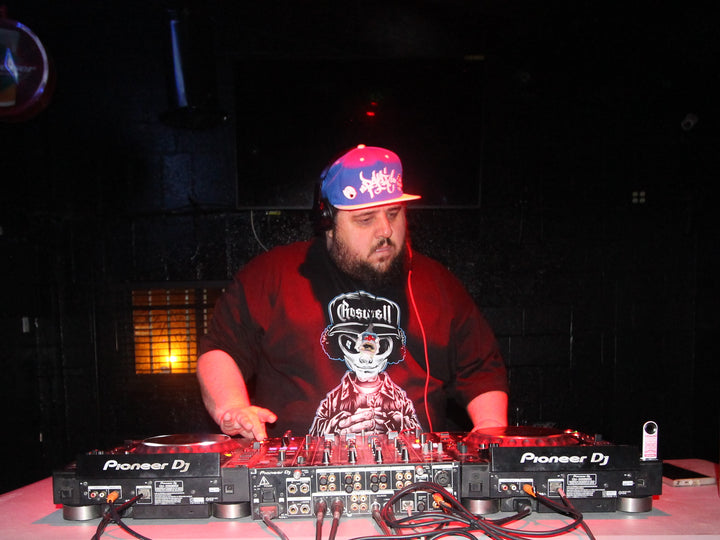 DJ mixing on Pioneer decks at Old Town Bass, Dyl Pickles' birthday, Apple Valley, March 2024