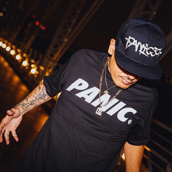 Ozik (OZ1K) wearing a Panic 39 snapback and PANIC. tee. Photo: Firme Elena